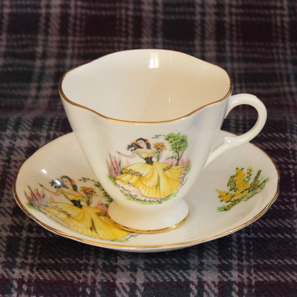 Windsor England Bone China Lady in Yellow Teacup and Saucer